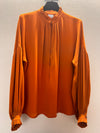 Plisse’ sartoriale blouse